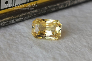  Vivid Yellow Sapphire. Radiant Cut. 0.89 ct. This small precious stone is full of life and color, its bright yellow is superb, has a nick in the crown, (this is the reason of its low price), but is an incredible gemstone that will look impressive in any ring or any piece of jewelry.