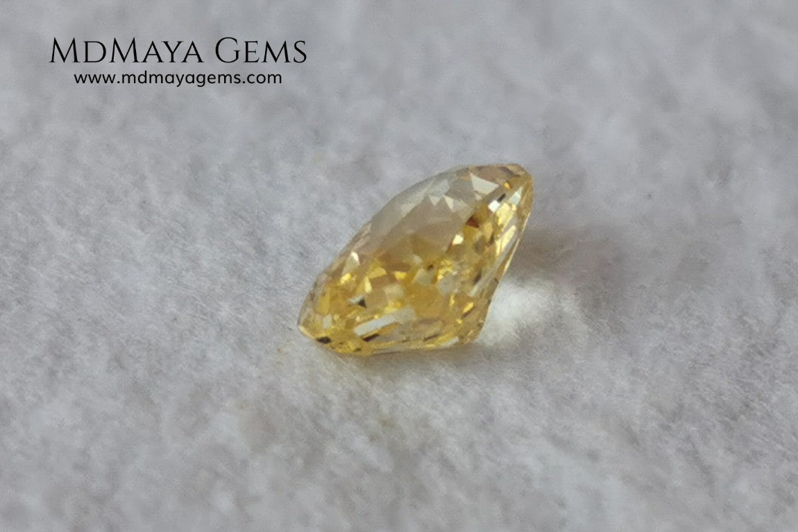  Vivid Yellow Sapphire. Radiant Cut. 0.89 ct. This small precious stone is full of life and color, its bright yellow is superb, has a nick in the crown, (this is the reason of its low price), but is an incredible gemstone that will look impressive in any ring or any piece of jewelry.