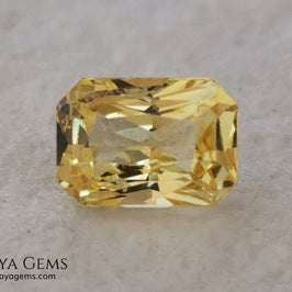 Vivid Yellow Sapphire. Radiant Cut. 0.89 ct. This small precious stone is full of life and color, its bright yellow is superb, has a nick in the crown, (this is the reason of its low price), but is an incredible gemstone that will look impressive in any ring or any piece of jewelry.