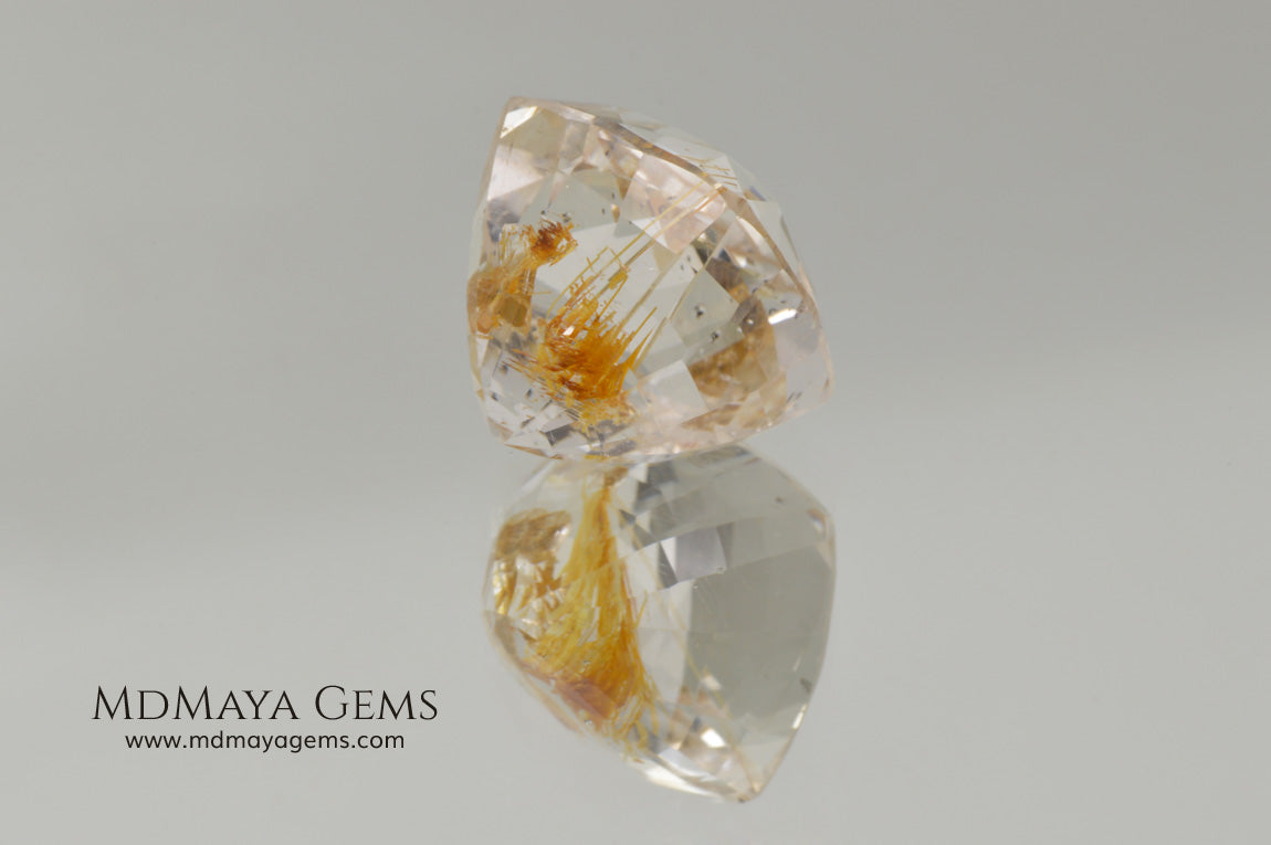White topaz with amazing golden inclusions 19.62 ct