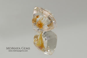 White topaz with amazing golden inclusions 19.62 ct