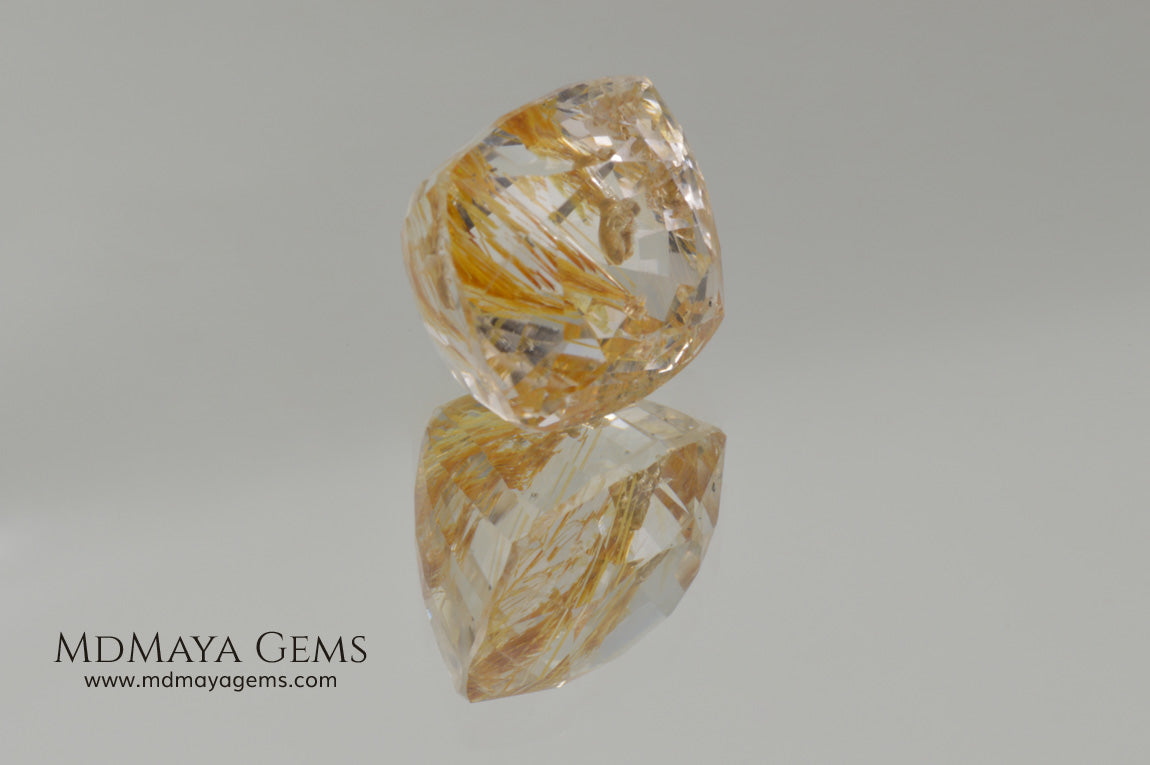 White topaz with amazing golden inclusions 19.62 ct