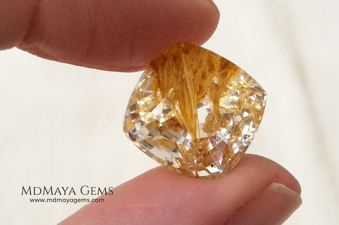 White topaz with amazing golden inclusions 19.62 ct