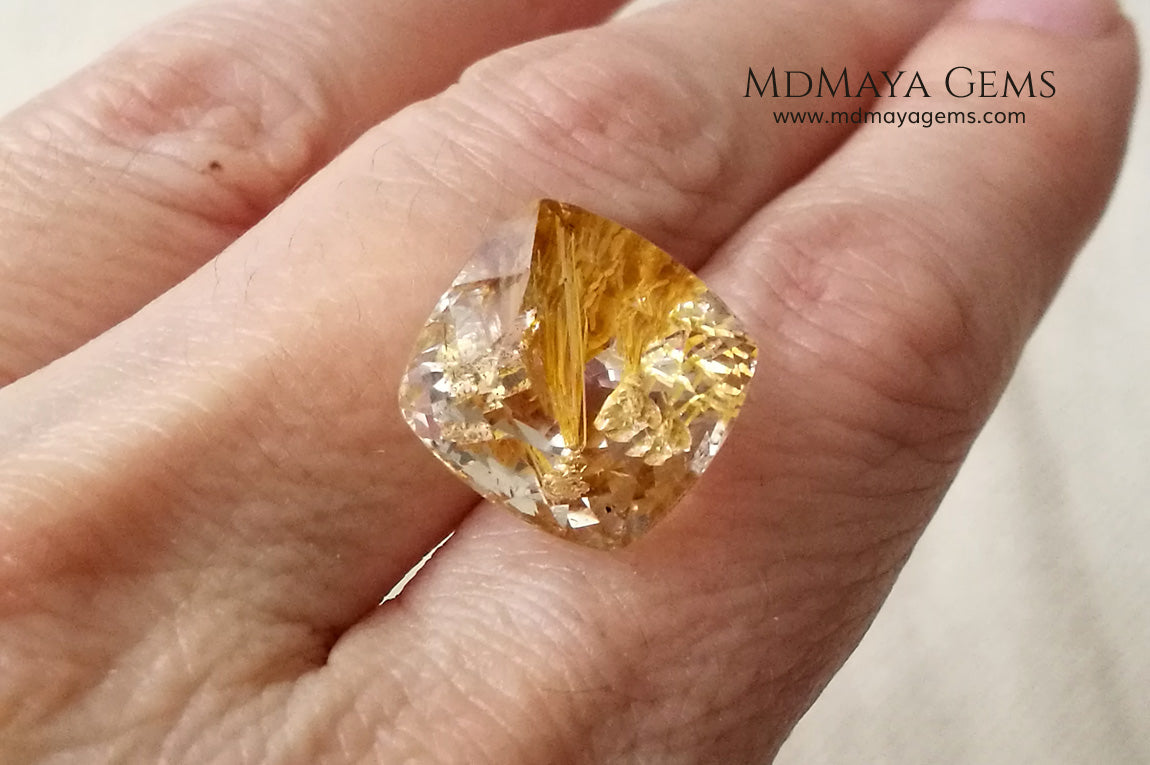White topaz with amazing golden inclusions 19.62 ct